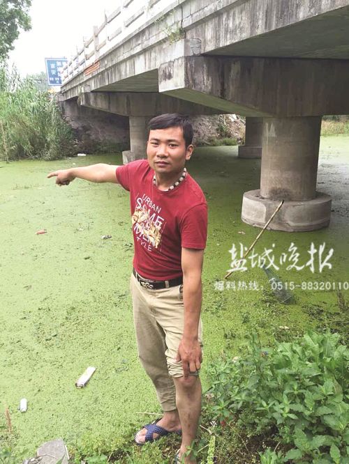 残疾人周建国第一个下河救人