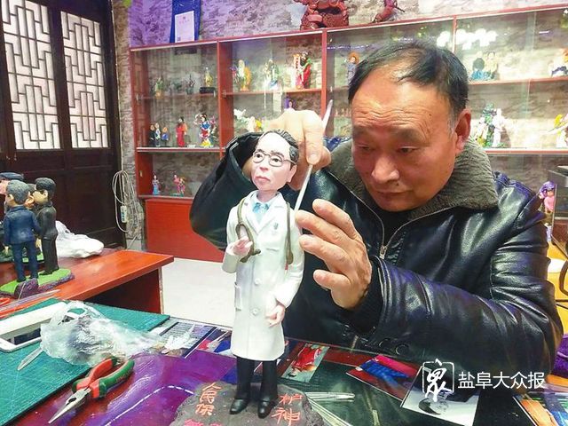 61岁面塑非遗传人周必良岁面塑非遗传人周必良 巧